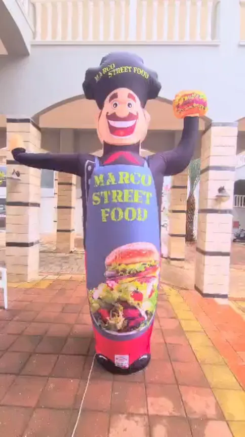 Marcu Street Food — Kochfigur mit Produktpräsentation