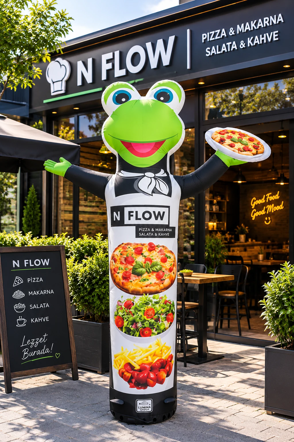 N Flow — Frosch-Kochmaskottchen mit Pizza